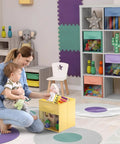 Mother organizing toys with Total Game Changer Storage Bins With Clear View Panels, Foldable Pop Up Organizers, 13 Inch Pastel Multi Color Six Pack Set For Closet Decluttering And Home Organization.