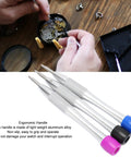 Color Coded Triangular Bit Set For 3235 Watch Movements with ergonomic aluminum handles on wooden table.