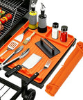 Rollable Silicone Grill Mat For Griddle Tools And BBQ Accessories on side shelf with tools and sauces, orange, for tailgating.
