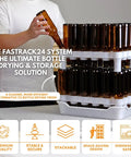 Top Shelf Bottle Drying Rack And Tray Bundle For Homebrewers holds sixty vessels, stackable drying racks with amber bottles.