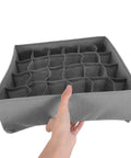 Set Of Three Foldable Cloth Underwear Organizers To Chill Out Drawer Chaos And Keep Your Closet Fresh While Giving Delicate Bras Extra Love During Your Busy Weekday Hustle - grey fabric organizer with divided compartments.