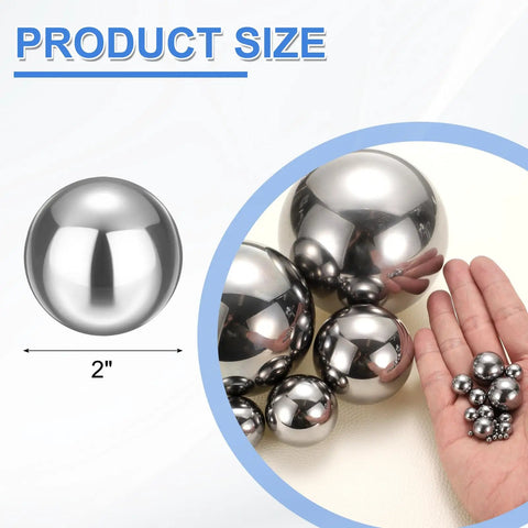 Bulletproof Build Two Inch Chrome Steel Bearing Balls G25 Precision Mirror Finish with hand holding smaller balls.