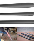 Three Piece Blacksmith Drift Tool Kit For Large Hammer Tomahawk And Axe Eye Drifts Eye Hole Tools displayed in workshop