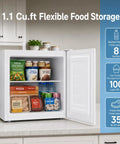 Compact 1.1 Cu Ft Upright Mini Freezer In Bright White For Dorms Small Apartments And Garages with frozen food and drinks inside.