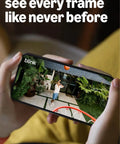 Person viewing Outdoor 2K Plus Wireless Smart Security Camera video on smartphone screen, displaying basketball scene.
