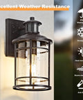 Heavy Duty Motion Sensor Outdoor Wall Lights Dusk To Dawn Porch Light Brown Waterproof Fixture Offering Three Easy Switch Modes And Wide Forty Foot Range For Truly Hassle Free Security Two Pack attached to a wall with water droplets.