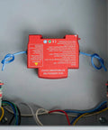 Reliable Auto Aerosol Fire Extinguisher A Straight Up Weekend Warrior Must Have For Under The Hood Emergencies Quick Automatic Engine Bay Suppression Compact Car Safety Gear visible in an electrical housing.