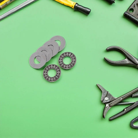2 Piece Flat Needle Roller Thrust Bearing Set Crafted From Pro Grade Steel Designed To Roll Quiet And Hold Up Crazy Under Heavy Loads On Commercial Rigs with tools.
