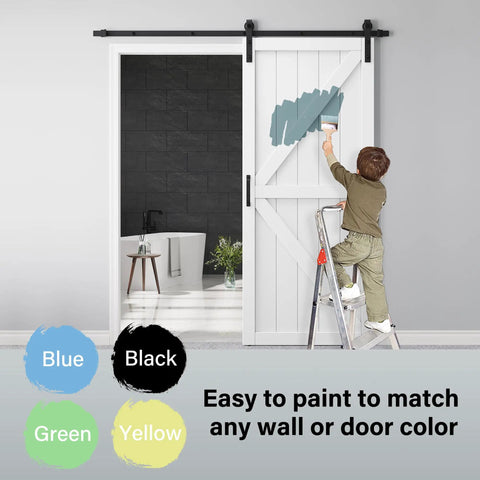 Rock Solid 72X84 K Shape Barn Door Crafted From Premium Kiln Dried MDF With Full Hardware Kit showing a child painting the door.
