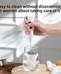 Hand holding USB Rechargeable Milk Frother Handheld 3 Speed Electric Wand With Digital Display For Creamy Cappuccino Latte