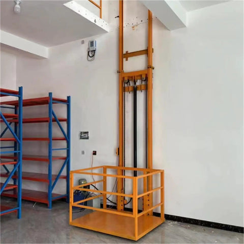 Workhorse Grade Mobile Lift Platform For Smooth Industrial Vertical Material Handling Single Operator Cargo Elevator System Built Like A Tank With Thickened Steel For Hassle Free Warehouse Loading in a warehouse setting.