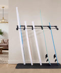 Keep Your Sick Gear Organized With This Heavy Duty Surfboard Wall Mount Vertical Paddle Board Rack Featuring Hella Secure Rubber Padding For Effortless Garage Storage And Zero Clutter Vibes with four surfboards.