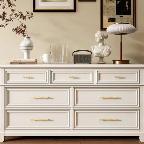 Premium Brushed Gold Cabinet Pulls 3 Inch Hole Center on a white dresser with various decor, showcasing modern design.
