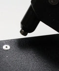 Size Forty Four Button Head Blind Rivets One Eighth Inch Diameter Three Sixteenths To Quarter Inch Grip Range Three Oh Four Stainless Steel Marine Grade Heavy Duty Fasteners in use with a rivet gun.