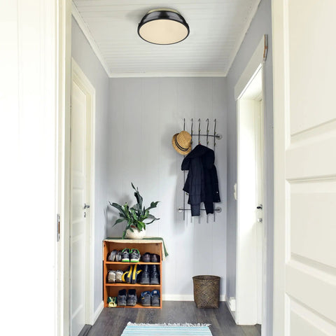 Duncan 14 Inch Two Light Flush Mount Ceiling Light Damp Rated Vintage Inspired Fixture in hallway with shoes and coat rack.