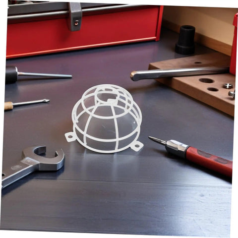 Heavy Duty Fire Sprinkler Ceiling Cover With 6mm Mounting Hole Featuring Slick Mesh Safety Guard For Smoke Detectors and Decorative Metal Shield on workbench.