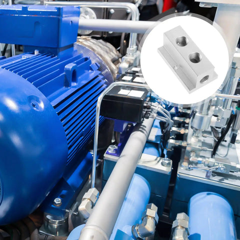 T-Type Pneumatic Air Distribution Block 2-Position 4-Port Compact Gas Manifold amidst industrial machinery setup.