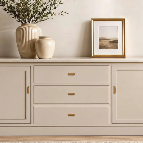 Stone top sideboard featuring Rock Solid Antique Brass Cabinet Pulls For Kitchen Cabinets And Hefty Drawers 3 Inch Hole Center.