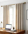 Brass Curtain Rods For Windows 30 To 88 Inch Adjustable Built Tough Metal 1 Inch Pipe Drapery Rods Decorative Modern Rustic Blackout Rods With Twisted Cage Finials displayed above window with beige curtains, desk, and lamp.
