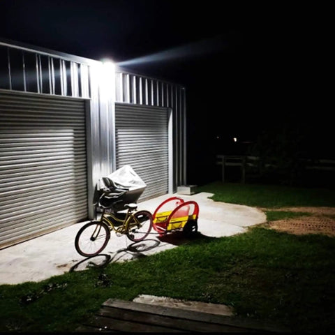 LED Barn Light With Dusk To Dawn Sensor And Motion Detection, 55W 7500LM 5000K Daylight Output, illuminating garage area