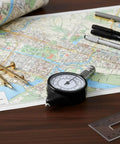 Trail Tested Map Measuring Wheel Odometer For Camping Hiking And Backcountry Adventures on paper map for precise distance measurement.