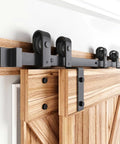 Close-up of 12 Ft Single Track Bypass Sliding Barn Door Hardware Kit featuring heavy duty black powder coated aluminum track.