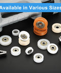 Top Shelf Nylon U Type Groove Bearings Features Twelve White Rollers Designed For Flat Out Smooth Gliding Motion On Heavy Duty Retractable Slides And Jigs scattered with various sizes on a black surface.