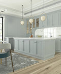 Straight Up Brushed Nickel Cabinet Knobs For Kitchen Updates Made From Rugged Zinc Alloy With Clean Satin Look Comes Fully Equipped With Mounting Hardware For Zero Sweat Installation And Instant Space Refresh in modern kitchen with gray cabinets and pendant lights.