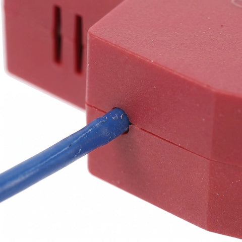 Close-up of Automatic Fire Extinguishing Device Dual Line Aerosol module with blue wire, designed for car fire suppression.