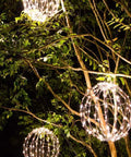 16 Inch LED Light Ball For Indoor And Outdoor Use With Warm White Lights Waterproof And Durable Lightweight Holiday Decor in trees