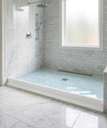 Shower with Three Inch Tall Collapsible Shower Threshold Water Dam 59 Inch Long Water Splash Guard Barrier installed on floor