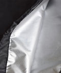 Close-up of silver-coated interior of Beige 3 Seater Patio Swing Canopy Replacement Top Cover Waterproof 210D Oxford Cloth
