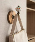 Old School Cool Antique Ceramic Wall Hooks With Rock Solid Wood Base Showstopper Entryway Coat Rack Pair Handpainted Heavy Duty Closet Hanging Organizer For Mudroom And Hallway, displaying handbag on a painted porcelain hook.