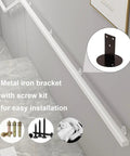 Rugged White Solid Wood Guardrail Loaded With Beefy Steel Brackets For Indoor Attic Or Stairway Safety Barrier Built Like A Tank Non Slip Grip Kid Approved Home Defense Six Point Six Feet Long with metal brackets for installation.