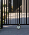 Heavy Duty Sliding Gate Hardware Kit With Rock Solid Double Roller Track Handles 600 Lbs close-up of gate roller on driveway.
