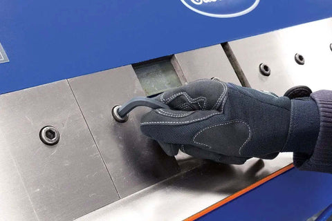 Gloved hand adjusting 48 Inch Pan And Box Sheet Metal Brake With Adjustable Removable Fingers for precise 135 degree bends and versatility.