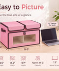 No Hassle Straight Up Foldable Fabric Storage Bins With Tough Lids And Transparent Panels For Rapid Grab Makes Home Sorting A Total Cinch Lightweight Build, pink fabric storage bin with clear panel, shows size against a 13" laptop.