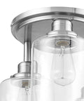 Close-up of Three Light Semi Flush Mount Ceiling Light With Brushed Steel Finish And Clear Glass Shades E26 Socket Front Porch Lighting Fully Dimmable Bulb Not Included Industrial Modern Vibe