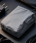 Heavy Duty EV Charger Cover With Snag Proof Drawstring Closure Waterproof Dustproof Weather Guard Built Tough As Nails For Outdoor Plug Protection Goes Hard Rain Or Shine, gray fabric close-up.
