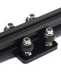Top Shelf Pom V Slot Wheels And Pulleys Kit With Double Bearings Plus Hexagonal Eccentric Posts And Round Spacers For Fly Performance Aluminum Extrusion 3D Printer Mods, close-up of black POM cups on aluminum rail.