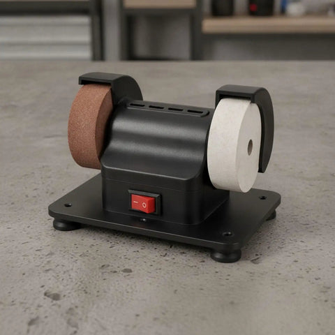 Top Shelf Twin Wheel Bench Grinder With Straightforward Rocker Switch Heavy Duty Electric Edger on workbench surface.