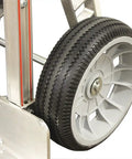 Smooth Riding Pneumatic Caster Wheel Equipped With A Rugged 3 1/4 Inch Hub Rated For Solid 300 Pound Loads on hand truck