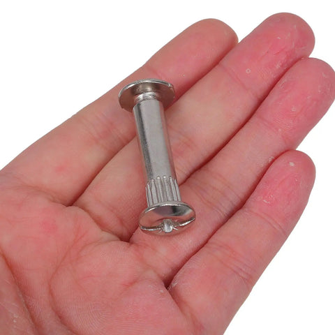 M6 Binding Screw Posts And Cabinet Hardware, 100 Piece Cold Rolled Steel Furniture Connectors held in a hand.