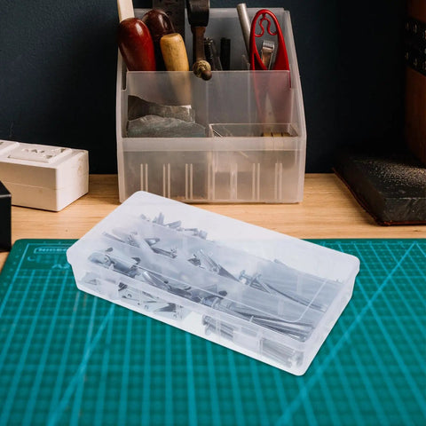 Heavy Duty Toggle Bolt And Wall Anchors Kit For Drywall And Hollow Walls For DIYers in clear plastic box on workbench