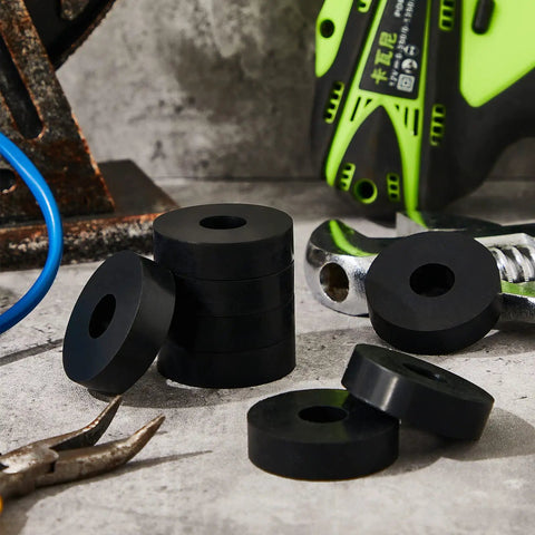 Killer 4 Pc Thick Rubber Isolation Pads And Vibration Damping Washers 1 5 Inch Od stacked on a workshop table.