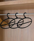 10 Pack Black Plastic Scarf Organizer With Rotating Swivel Design For Closet Storage space saving multi-layer hangers on a rod.