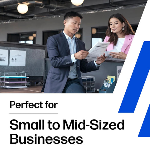 Business professionals reviewing documents in an office, promoting a solution perfect for small to mid-sized businesses.