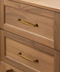 Top Notch Antique Brass Cabinet Pulls 10 Pack Featuring 5 Inch Center Hole Spacing on wooden dresser drawers.