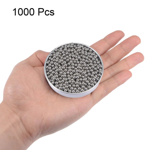 Sickly Smooth One Thousand Piece Four Millimeter G200 Grade Number 201 Stainless Steel Ball Bearings in hand.