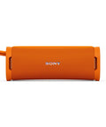 Ultimate Field 1 Waterproof Portable Bluetooth Speaker With Dope Bass And 12 Hour Battery Life IP67 Dustproof Shockproof Rustproof Detachable Strap SRSULT10D Orange, front view.